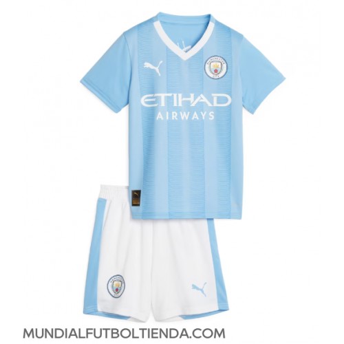 Camiseta Manchester City Primera Equipación Replica 2023-24 para niños mangas cortas (+ Pantalones cortos)